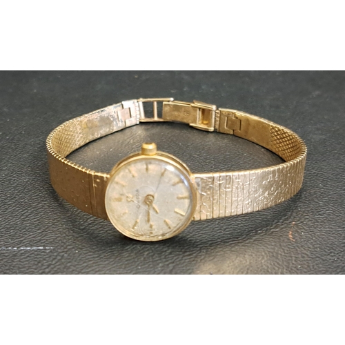 58 - LADIES OMEGA NINE CARAT GOLD WRISTWATCH
the dial with baton five minute markers, on nine carat gold ... 