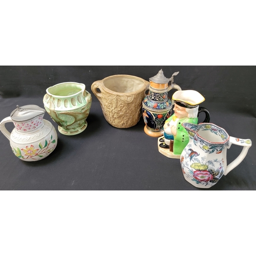 SELECTION OF DECORATIVE CERAMICS
including a Hillstonia bark texture jug; an Albert Boquet water jug with flower pattern; 'Boozer' Toby Jug stamped Burlington Ware; Burleigh Ware with depiction of geese in flight; West German stein featuring a hunting scene and a pitcher with flower motif