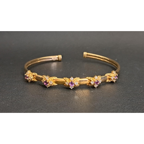 8 - AMETHYST AND CZ SET NINE CARAT GOLD BANGLE
the open bangle with five amethyst and CZ clusters, appro... 