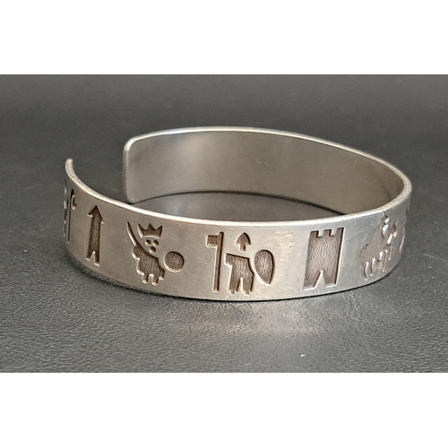 43 - MICHAEL HILLIAR IRISH SILVER 'HISTORY OF IRELAND' CUFF BANGLE
the 13 engraved symbols representing i... 