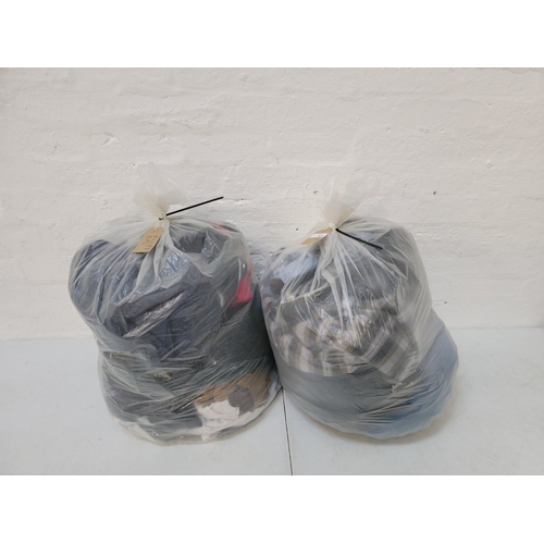 37 - TWO BAGS OF GENTS CLOTHING ITEMS
including: North Face, Nike and Lacoste