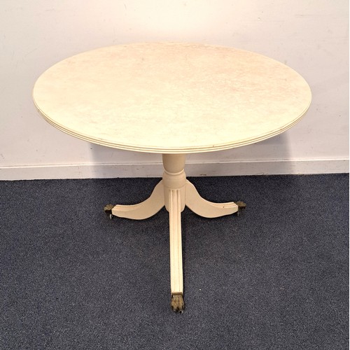 WHITE SHABBY CHIC BREAKFAST FLIP TOP TABLE
on pedestal, with brass claw feet on casters, 91 diameter x 76cm high