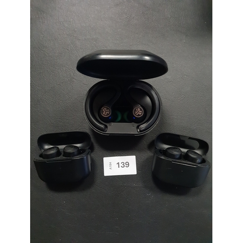 139 - THREE PAIRS OF JLAB EARBUDS IN CHARGING CASES