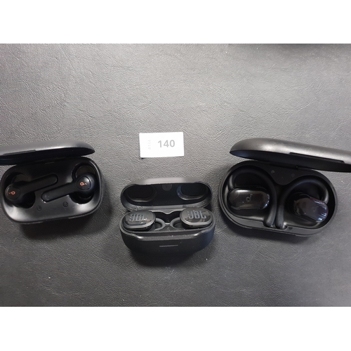 140 - THREE PAIRS OF EARBUDS IN CHARGING CASES
comprising JBL and 2x Soundcore