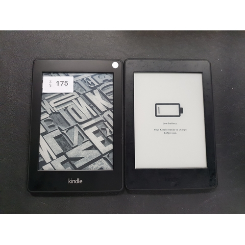 175 - TWO AMAZON KINDLE PAPERWHITE E-READERS
comprising a Paperwhite 3, serial number G090 G505 5206 0FT5 ... 