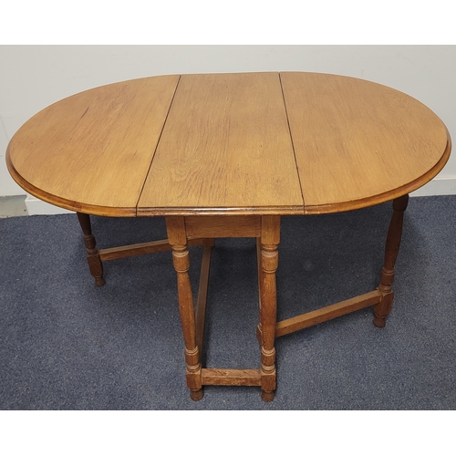 454 - VINTAGE OAK GATELEG DROP LEAF DINING TABLE
with turned legs, 91 x 76 x 122cm extended