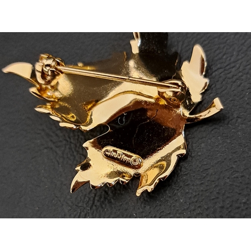 26 - VINTAGE CHRISTIAN DIOR GILT JEWELLERY
comprising a pair of earrings of twisted ring design, with cli... 