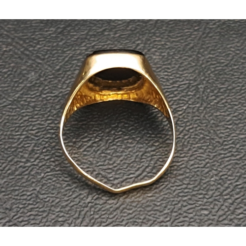 19 - BLACK AGATE SIGNET RING
the agate panel with diagonal gold detail, on nine carat gold shank, ring si... 
