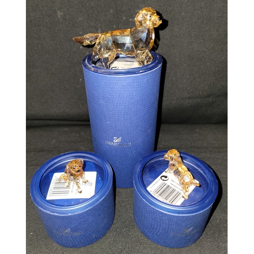 THREE SWAROVSKI GOLDEN RETRIEVERS
'Golden Retriever Mother' 1142823,  'Golden Retriever Puppy Standing' 1142824, Golden Retriever Puppy Sitting '1142825' , all in Swarovski boxes (3)