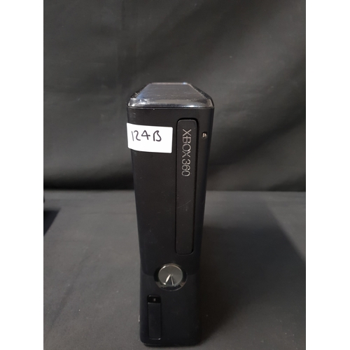 XBOX 360 GAMING CONSOLE
S/N: 077657312409
Note: no connection cables