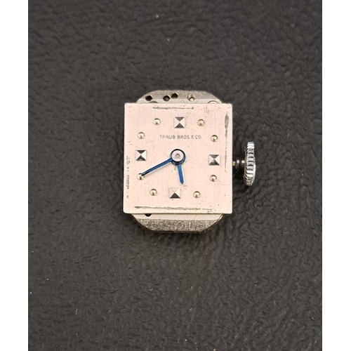 51 - LADIES CONCORD WATCH CO. FOURTEEN CARAT WHITE GOLD CASED COCKTAIL WATCH
the rectangular silvered dia... 