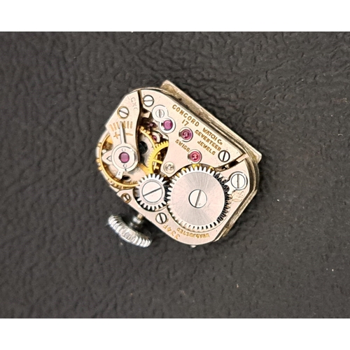 51 - LADIES CONCORD WATCH CO. FOURTEEN CARAT WHITE GOLD CASED COCKTAIL WATCH
the rectangular silvered dia... 