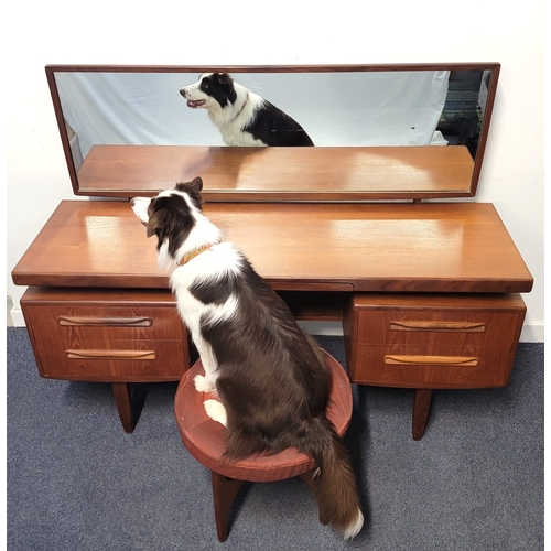 594 - MID CENTURY G-PLAN FRESCO TEAK DRESSING TABLE
with floating mirror, the two sets of drawers flanking... 