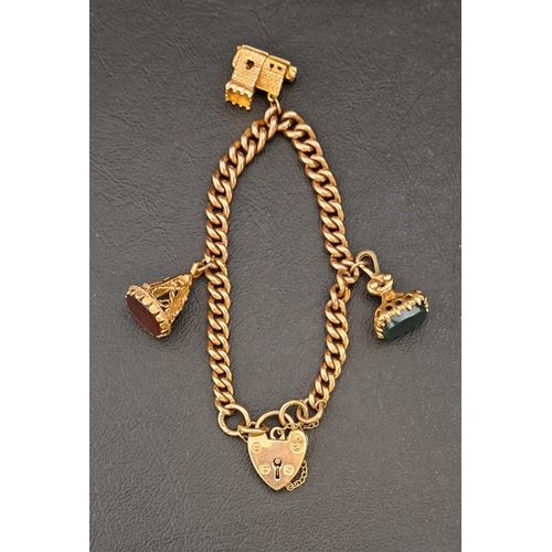 162 - NINE CARAT GOLD CHARM BRACELET
the curb link bracelet with nine carat gold heart padlock clasp, two ...