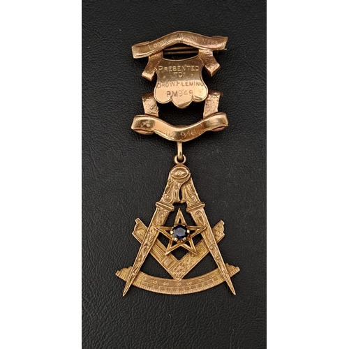 472 - NINE CARAT GOLD SAPPHIRE SET MASONIC JEWEL
the upper section engraved to the front 'Lodge Major Ness... 
