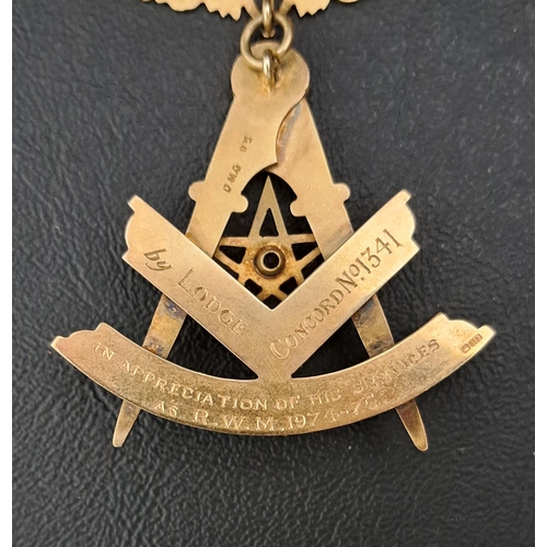 473 - WHITE GEM SET GOLD MASONIC JEWEL
the top bar engraved 'Presented to Bro. Robert Lamont.P.M.' and the... 