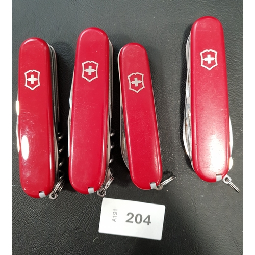 204 - FOUR VICTORINOX SWISS ARMY KNIVES
of various sizes and designs
Note: You must be over the age of 18 ... 