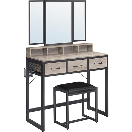 SONGMICS VASAGLE VANITY TABLE
Dressing table with 3-piece folding mirror, hair dryer holder, cosmetic table with padded stool, 3 drawers, industrial design, greige and black. 1 box, SKU number: RVT004B02V1 RRP: £99.99, box size 101.5 x 52.5 x 24cm and 27.9kg

Note: Box appears to have been re-sealed and we are unable to guarantee that no parts are missing or damaged. 
Stock images have been used for this lot - These images are for illustration only and there may be small variations from actual contents; All additional items shown on, in or surrounding the product are not included.