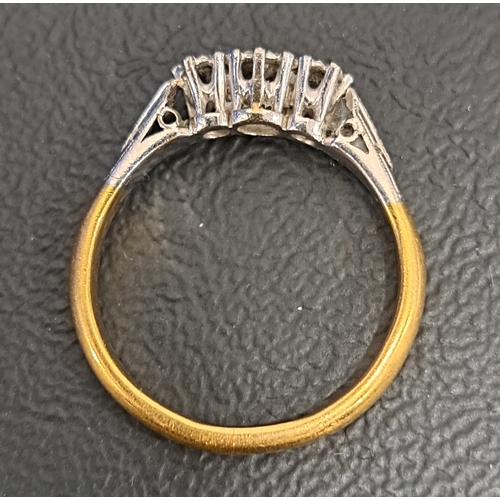22 - GRADUATED DIAMOND THREE STONE RING
the diamonds totalling approximately 0.1cts, on eighteen carat go... 