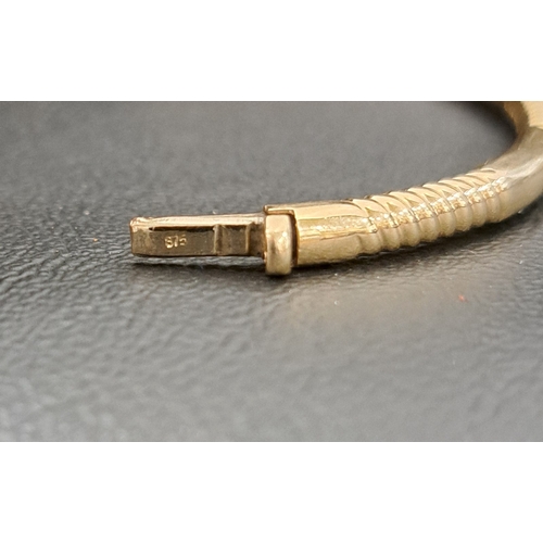 1 - NINE CARAT GOLD HINGED BANGLE
approximately 7.8 grams