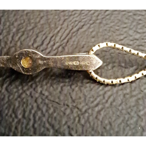 6 - DIAMOND THREE STONE PENDANT
the vertically set graduated diamonds totalling approximately 0.21cts, i... 