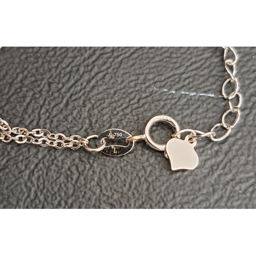 38 - EIGHTEEN CARAT WHITE GOLD BRACELET
the double strand bracelet with quatrefoil motif decoration, appr... 