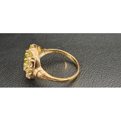 55 - PERIDOT CLUSTER RING
the central oval cut peridot approximately 1.5cts in twelve round cut peridot s... 