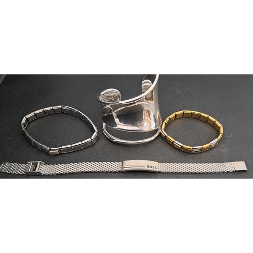 27 - SELECTION OF FASHION JEWELLERY BRACELETS/BANGLES
comprising a COS cuff bangle, a Hugo Boss bracelet,... 