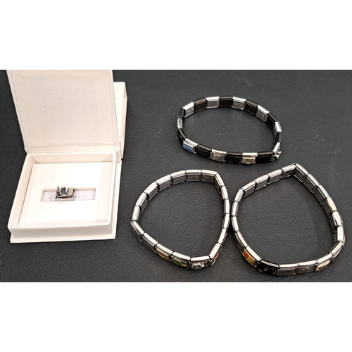 40 - THREE NOMINATION CHARM BRACELETS
with a total of 19 charms (one in box)
