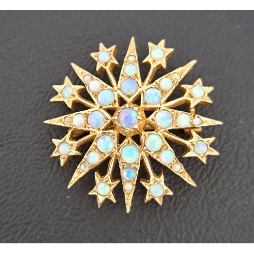 16 - ATTRACTIVE OPAL STARBURT BROOCH/PENDANT
the multiple opals in nine carat gold, 3cm wide and approxim... 