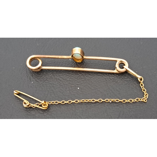 18 - OPAL SET BAR BROOCH
the oval cabochon opal measuring approximately 7 x 4mm, in unmarked nine carat g... 