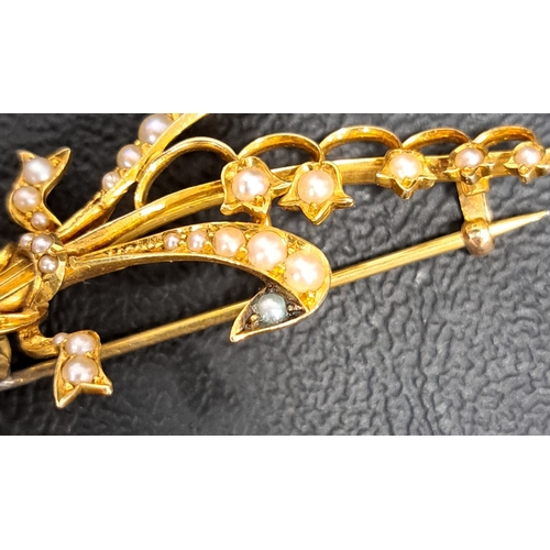 31 - SEED PEARL SPRAY BROOCH
in unmarked gold (tests as 14/15ct), approximately 5.2cm long and 5 grams, w... 