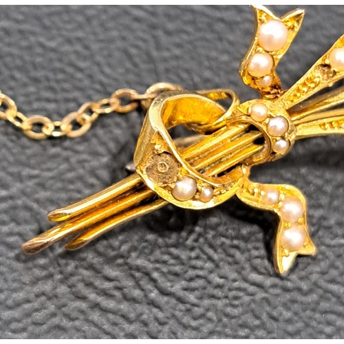 31 - SEED PEARL SPRAY BROOCH
in unmarked gold (tests as 14/15ct), approximately 5.2cm long and 5 grams, w... 