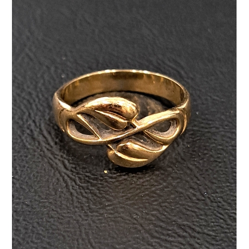 32 - OLA GORIE NINE CARAT GOLD 'CECILY' RING
with entwined floral motif detail, ring size M-N and approxi... 