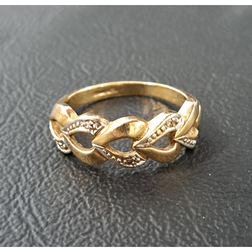 39 - DIAMOND SET NINE CARAT GOLD RING
with pierced heart motif setting, ring size M and approximately 2.5... 