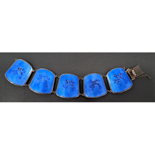 48 - NORWEGIAN ENAMEL DECORATED SILVER BRACELET BY KNUT ANDREAS RASMUSSEN
the five panels with blue ename... 