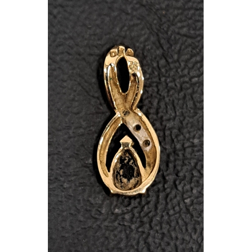 50 - SAPPHIRE AND DIAMOND SET PENDANT
in nine carat gold, 1.7cm high