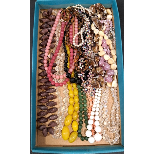 54 - SEVENTEEN VINTAGE BEAD NECKLACES
including crystal, amber effect, jade coloured hardstone, coral, et... 