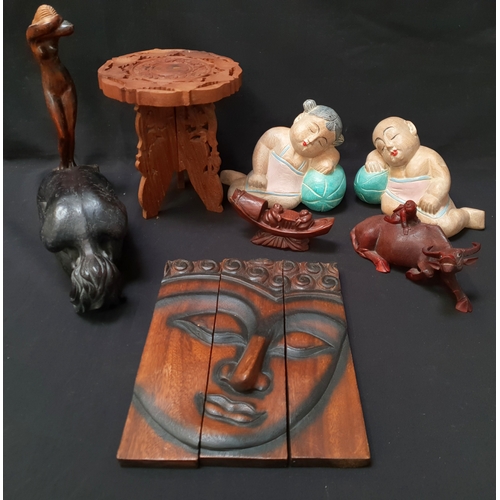 333 - SELECTION OF CARVED WOOD COLLECTABLES 
including a Chinese style figure with two men on a boat, 17cm... 