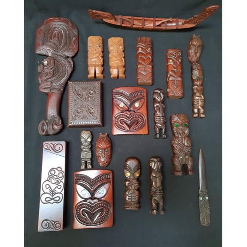 335 - SELECTION OF PACIFIC ISLAND AND MAORI CARVED WOOD COLLECTABLES 
comprising wall hanging decorations ... 