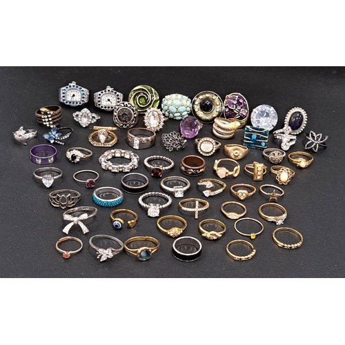 26 - LARGE SELECTION OF COSTUME JEWLLERY RINGS
including paste and enamel set examples