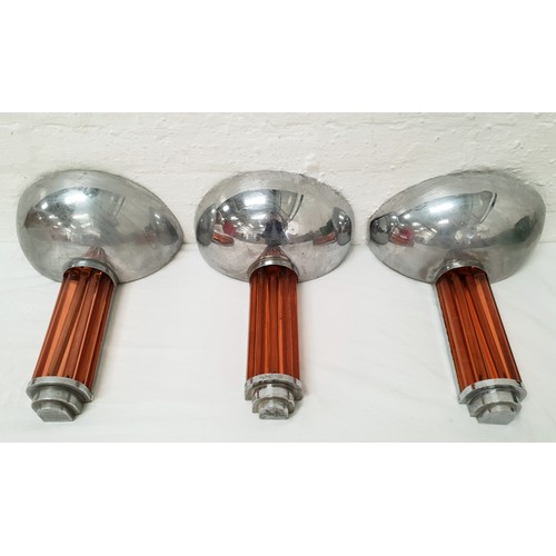 538 - SET OF SIX ART DECO WALL LIGHTS
with chrome half-spherical wall sconces above pink glass cylindrical... 