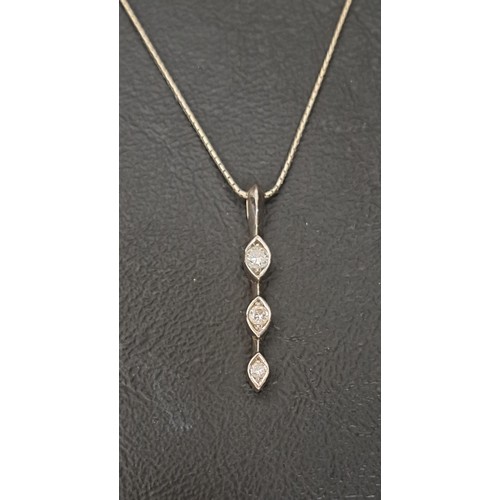 6 - DIAMOND THREE STONE PENDANT
the vertically set graduated diamonds totalling approximately 0.21cts, i... 