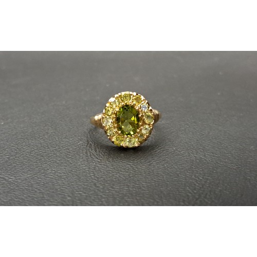 55 - PERIDOT CLUSTER RING
the central oval cut peridot approximately 1.5cts in twelve round cut peridot s... 
