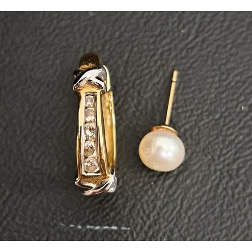 30 - SINGLE DIAMOND SET NINE CARAT GOLD EARRINGS
with channel set diamonds and X detail, approximately 2.... 