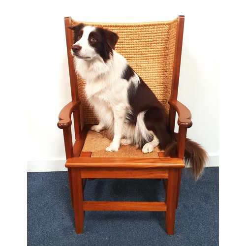 539 - 20th CENTURY OAK FRAMED ORKNEY CHAIR
by Robert H Towers, the top rail finished in marram grass, with...