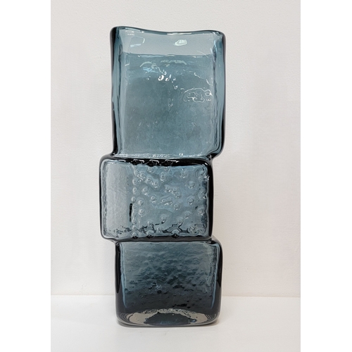 WHITEFRIARS 'DRUNKEN BRICKLAYER' VASE
the large size example circa 1967 and designed by Geoffrey Baxter, the vase in the form of three imperfectly stacked blocks, each with distinctive texture and in the indigo colourway, 33cm high