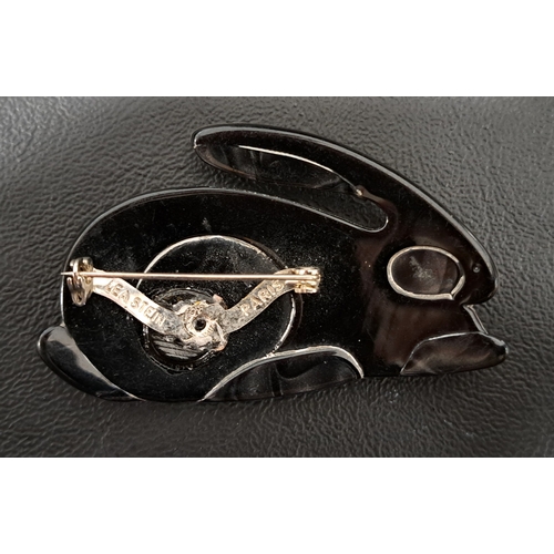 192 - LEA STEIN RABBIT BROOCH
with mottled red body and black eye, ear, feet and tail, marked 'LEA STEIN P... 