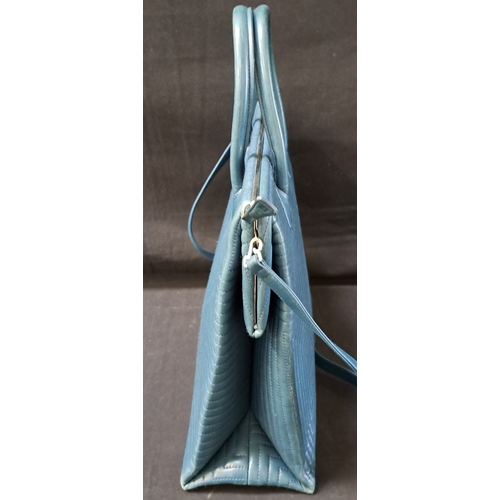 378 - BALLY GEOMETRIC TOTE BAG
early-to-mid 1990s, in turquoise quilted leather, silver-tone hardware, wit... 
