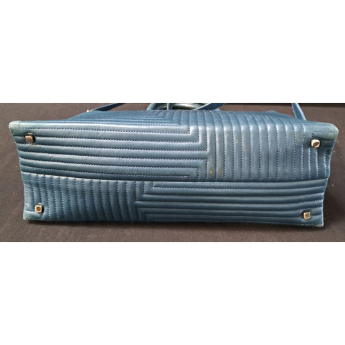 378 - BALLY GEOMETRIC TOTE BAG
early-to-mid 1990s, in turquoise quilted leather, silver-tone hardware, wit... 
